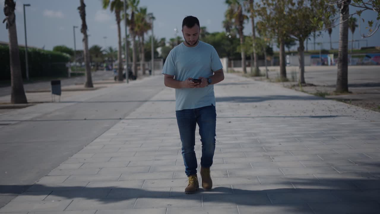 Man Walking in City Park