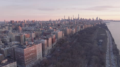 aerial view of the new york city skyline at dusk. shot in harlem looking south towards midtown manhattan.