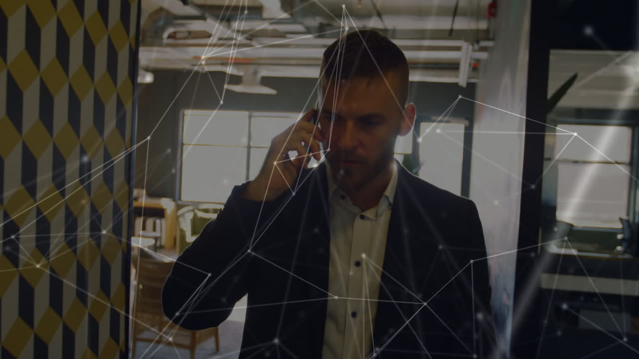 Animation of network of connections over caucasian businessman using smartphone