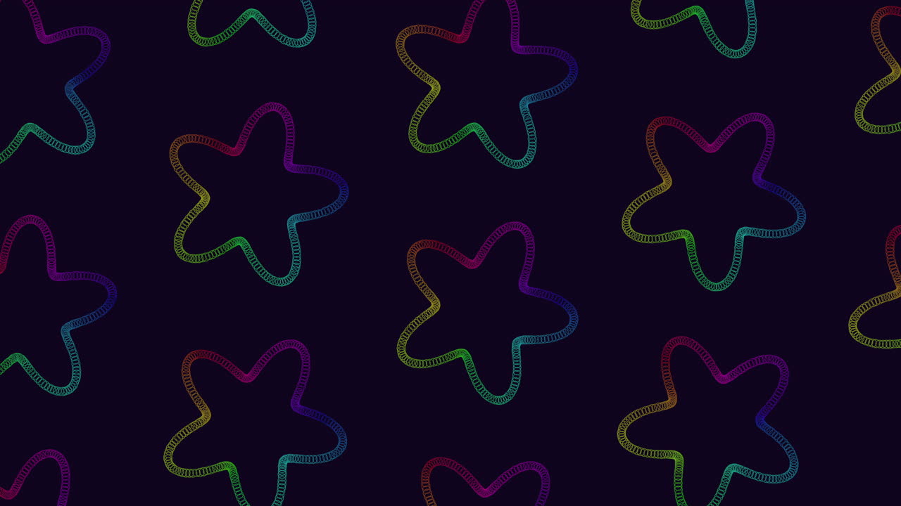 An aesthetically pleasing display of rainbow colored stars set against a black backdrop, creating a vibrant and eye-catching visual pattern