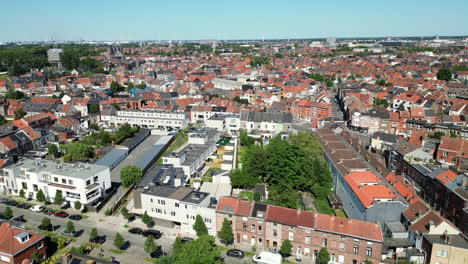 Zooming-Out-Aerial-of-Outskirts-Habitations-in-Ghent,-Belgium