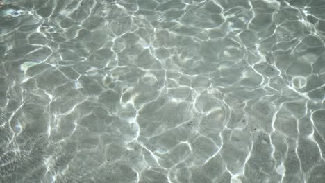 slow motion footage of crystal clear ocean water off the coast of hawaii. this clip is in 4k - slow motion.