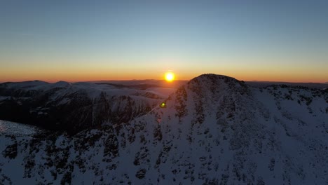 drone shot from musala peak during sunrise, bulgaria, rila mountain, highest peak on the balkans, golden hour, blue hour, dawn