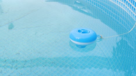 worker hands isinfection and chlorination of water in the pool. purification from pollution pool chlor dispenser