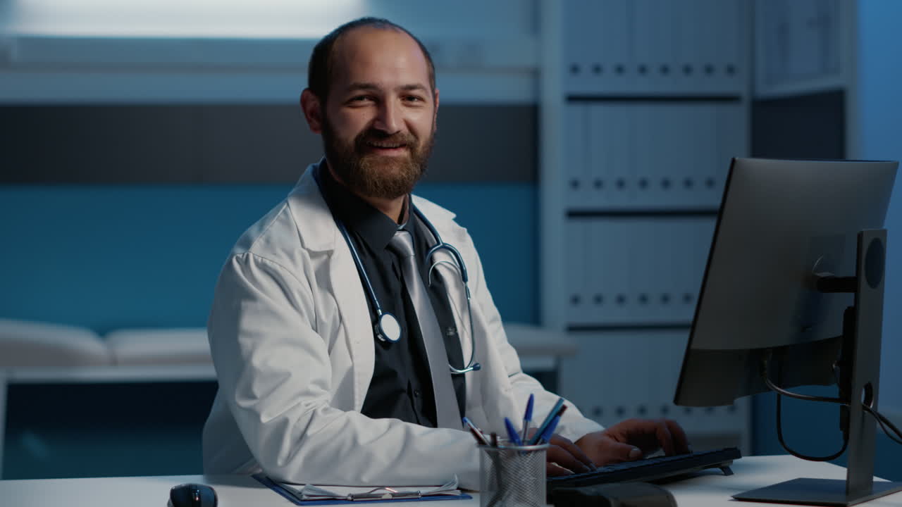 Doctor working on computer in office