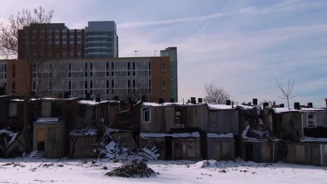 the poor live in makeshift slums during the winter in an american city