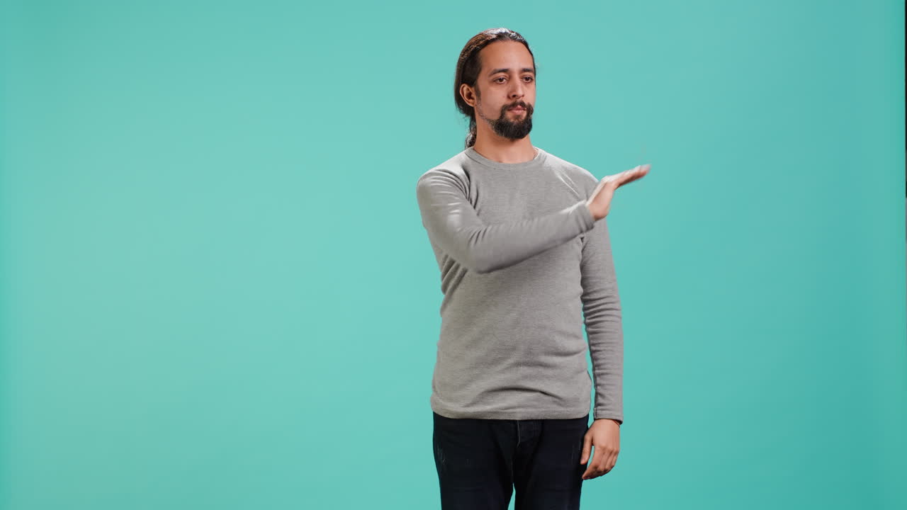 Man looking at AR hologram visualizations, doing swiping gestures