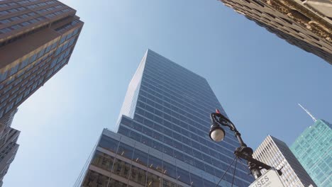 urban modern corporate buildings in downtown manhattan, new york usa, low angle view