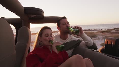 Couple-in-love-enjoying-free-time-on-road-trip-together