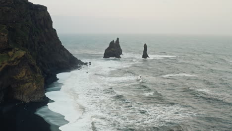 Cinematic-Aerial-Drone-Shot-of-Black-Sand-Beach-of-Reynisfjara,-Vik---Iceland