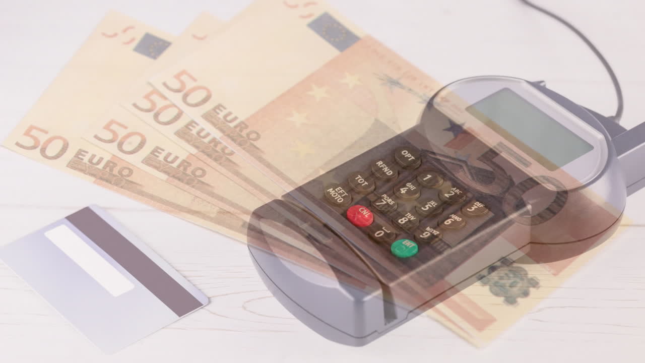 animación de billetes en euros que caen sobre el terminal de pago