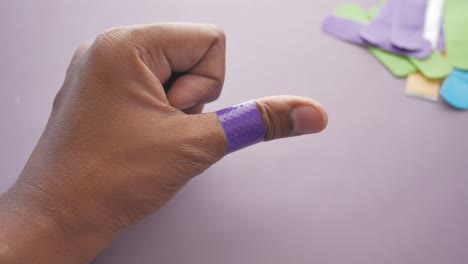 band-aid on thumb