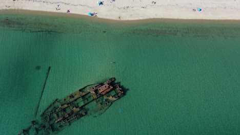 Epanomi&#039;s Shipwreck in the Glowing Embrace of Greek Summer: A 4K Drone Beach Adventure