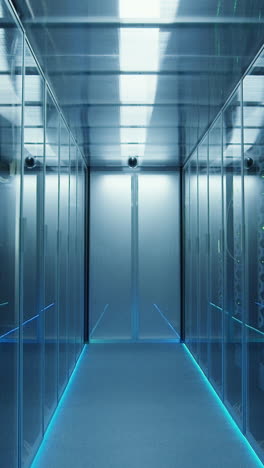 a modern data center corridor with blue lighting
