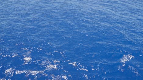 stunning blue ocean in a moving close up slow motion scene