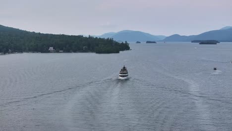 the adirondack cruise ship heading out in overcast day drone view in 4k