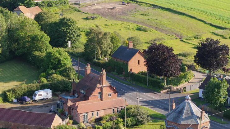 Quaint rural village is a small, picturesque settlement with traditional charm, characterized by historic houses and buildings and a peaceful atmosphere, beautiful natural landscapes, rolling hills