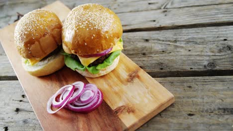 hamburgers with sliced onion