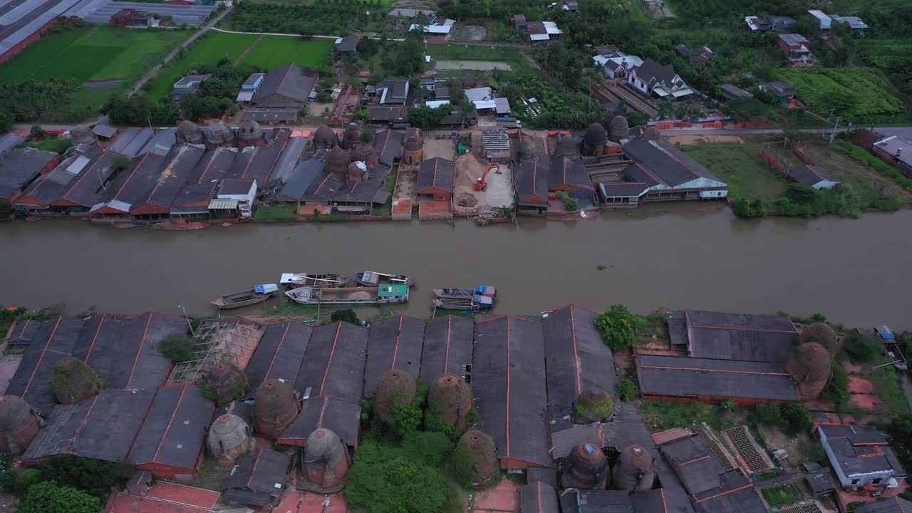 Aerial view of brick kilns and canal in Vinh Long in the Mekong Delta, Vietnam