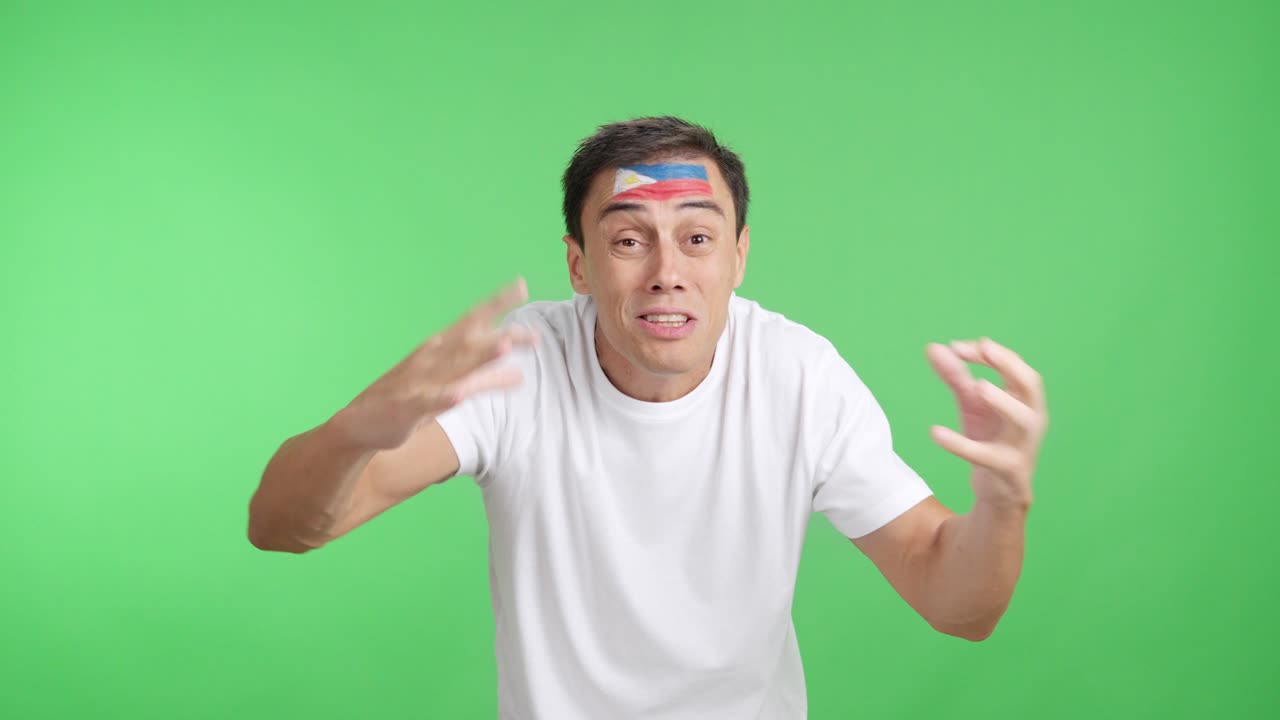 Man Cheering for Philippines, angry with the decision of referee