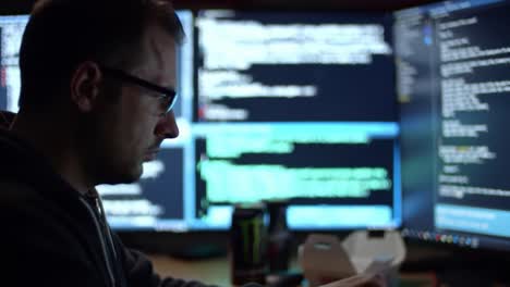 a focused programmer immersed in coding at night, surrounded by multiple monitors displaying lines of code and energy drinks in a dimly lit environment, exemplifying modern tech culture
