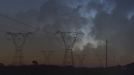 Transmission-towers-and-lightning-in-clouds