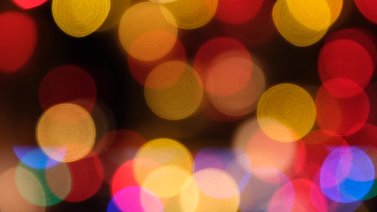 luces multicolores borrosas con efecto bokeh para la decoración festiva.
