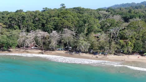 Costa-Rica-beach-drone-view-showing-sea,-shore-and-forest