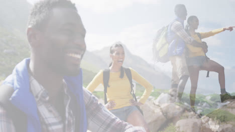 composite of happy african american couple hiking on mountain, and stopping to admire the view