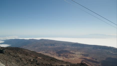 volcanic crater panorama landscape with cable car on a peak pico del teide on tenerife, canary islands in spring