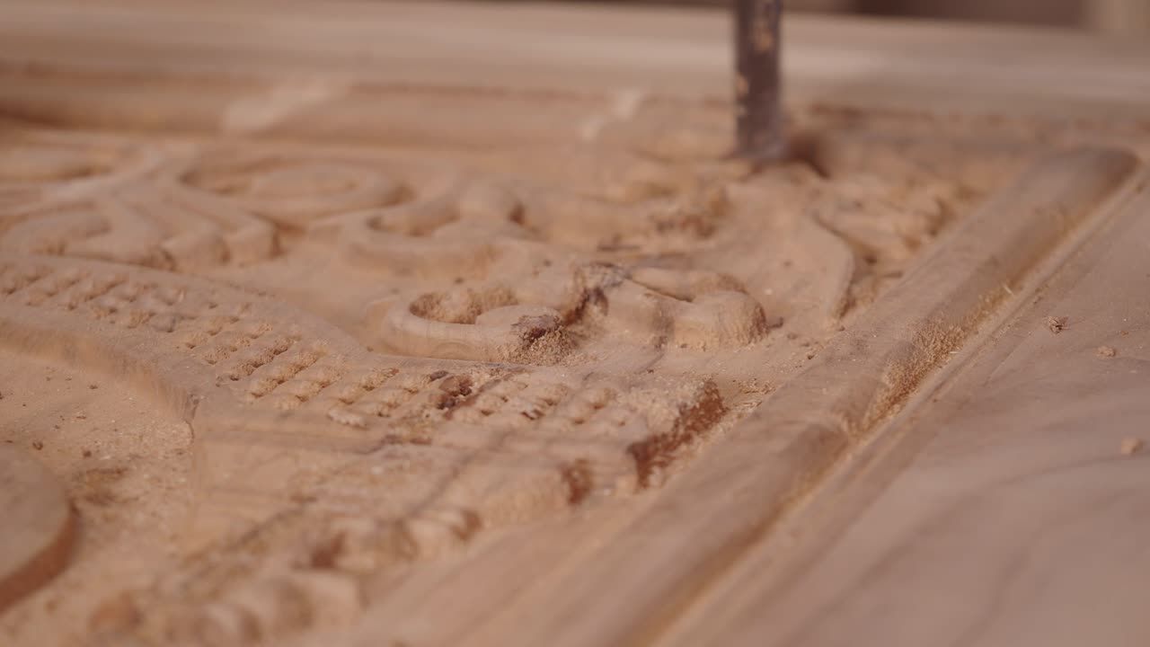 Close-up view of wood carving process