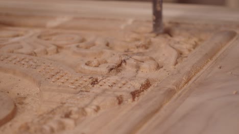 close-up view of wood carving process