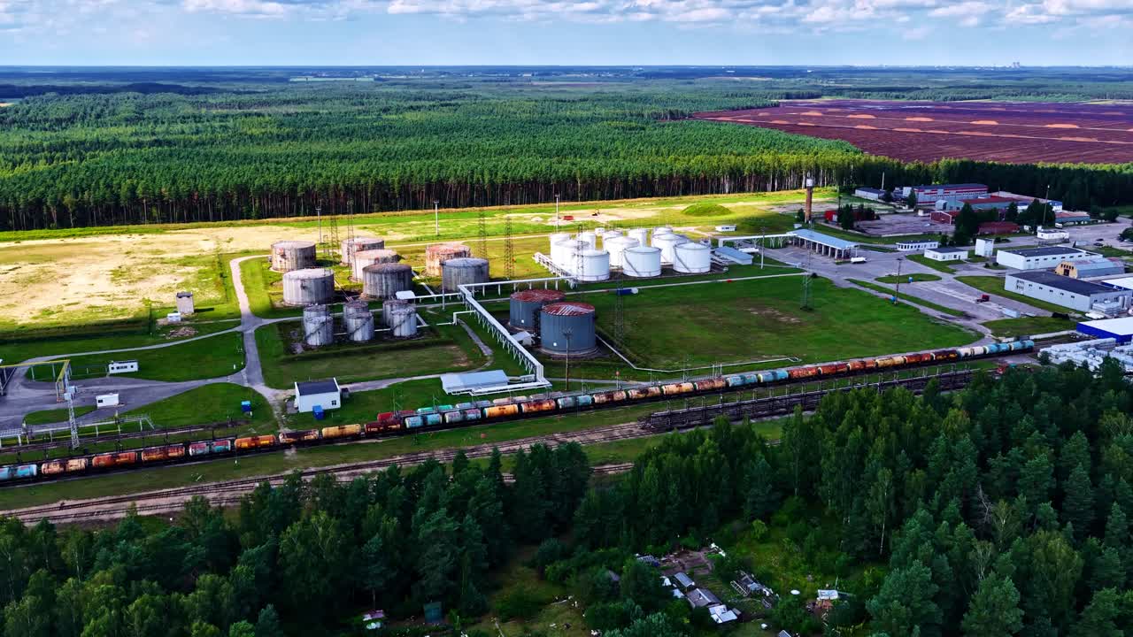 Industrial depot petroleum production oil storage tanks refinery plant factory, aerial