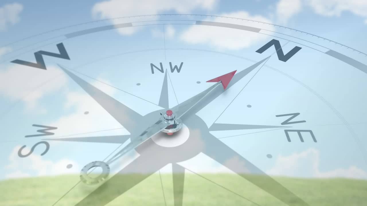 Animation starting, red compass needle pivoting SE to N, overlaying pasture to show bearing shift