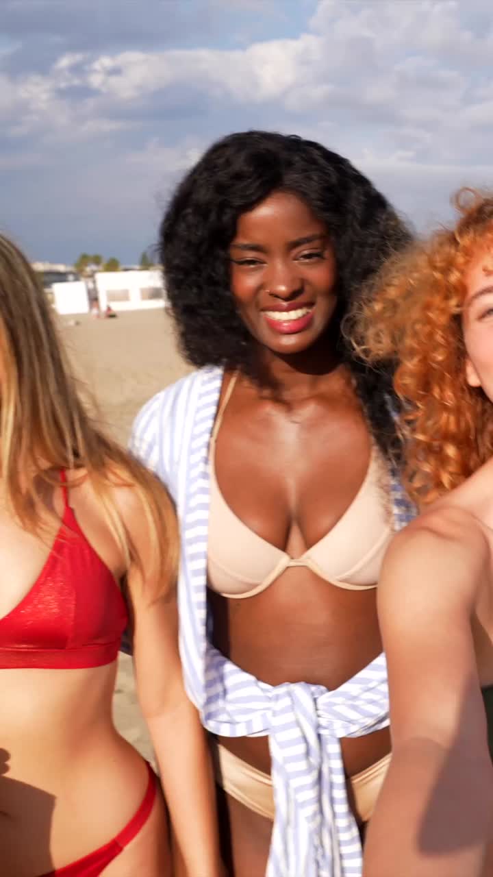 Women enjoying summer at the beach