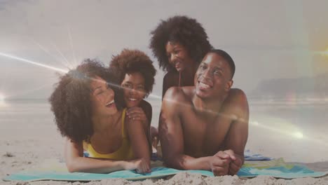 Animación-De-Puntos-De-Luz-Sobre-Una-Feliz-Familia-Afroamericana-Tumbada-En-Una-Playa-Soleada