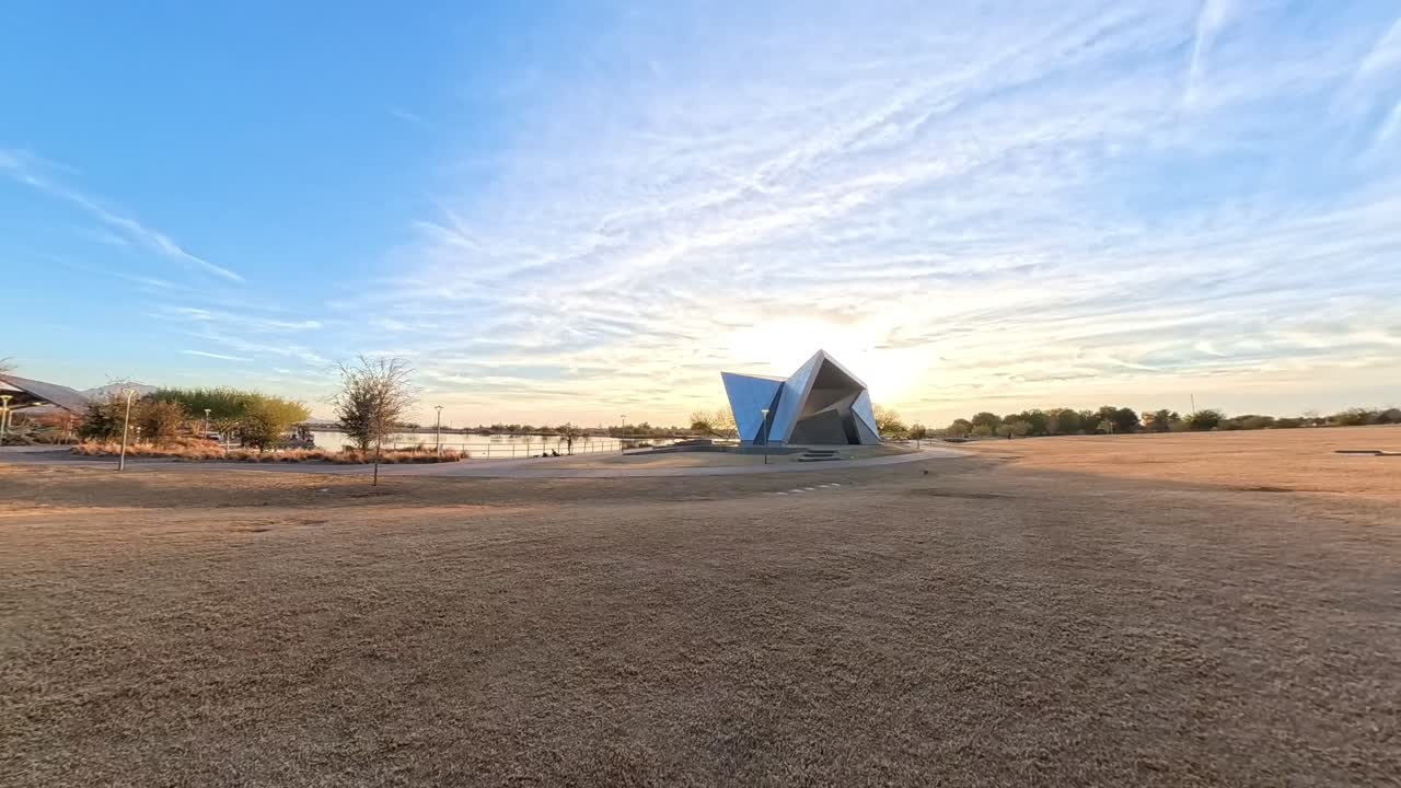 Panning Time lapse of Gilbert Amphitheater a modern geometric shaped monument.