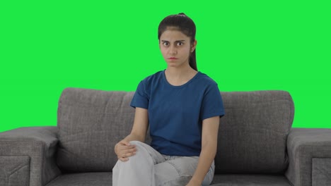 Angry-Indian-teenage-girl-looking-to-the-camera-Green-screen