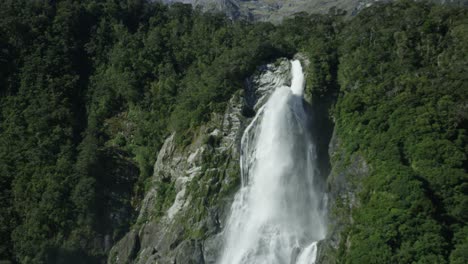 epic slow motion shot of waterfall in milford sound