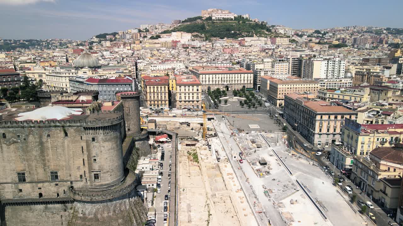 Naples, Italy. Aerial view of city port from a drone going up in the sky