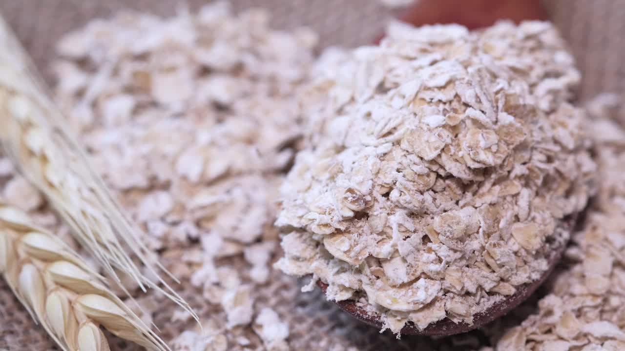 Rolled Oats in Wooden Spoon