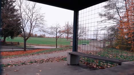 drone-flies-slowly-backward-and-passes-through-a-gazebo