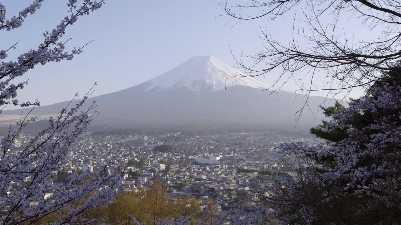 Incredible slow motion sunset over Mt. Fuji and Kawaguchiko city in spring