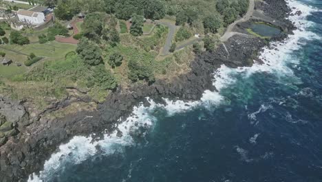 Natural-pools-along-rocky-coast-of-Santo-Antonio,-Sao-Miguel-island