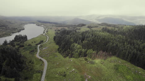 beautiful ireland aerial of a road leading through