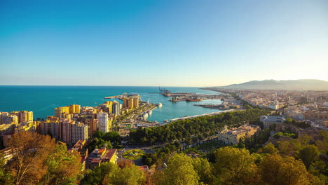 looking over the port of malaga, spain into the port and alboran sea - daytime time lapse