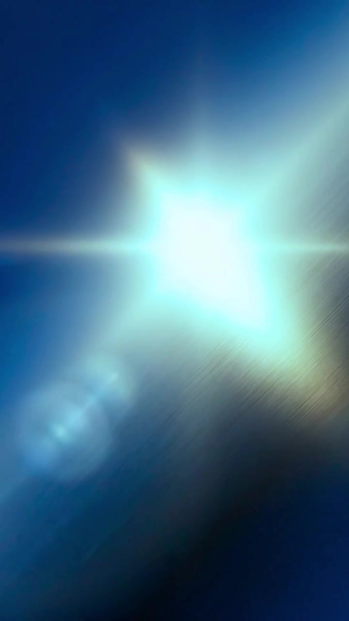 Bagliore di luce brillante che si muove su uno sfondo blu intenso