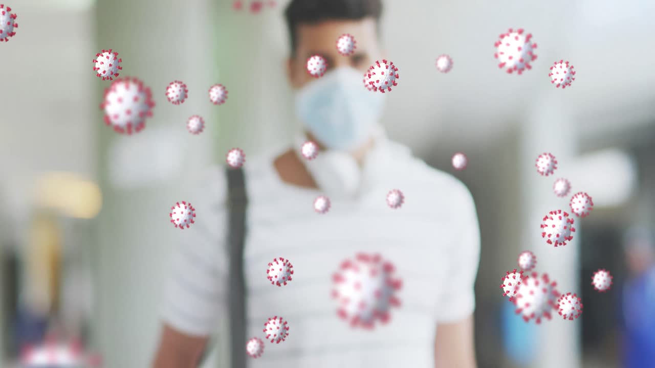 안면 마스크를 착용한 라틴인 남성 위에 바이러스 세포의 애니메이션