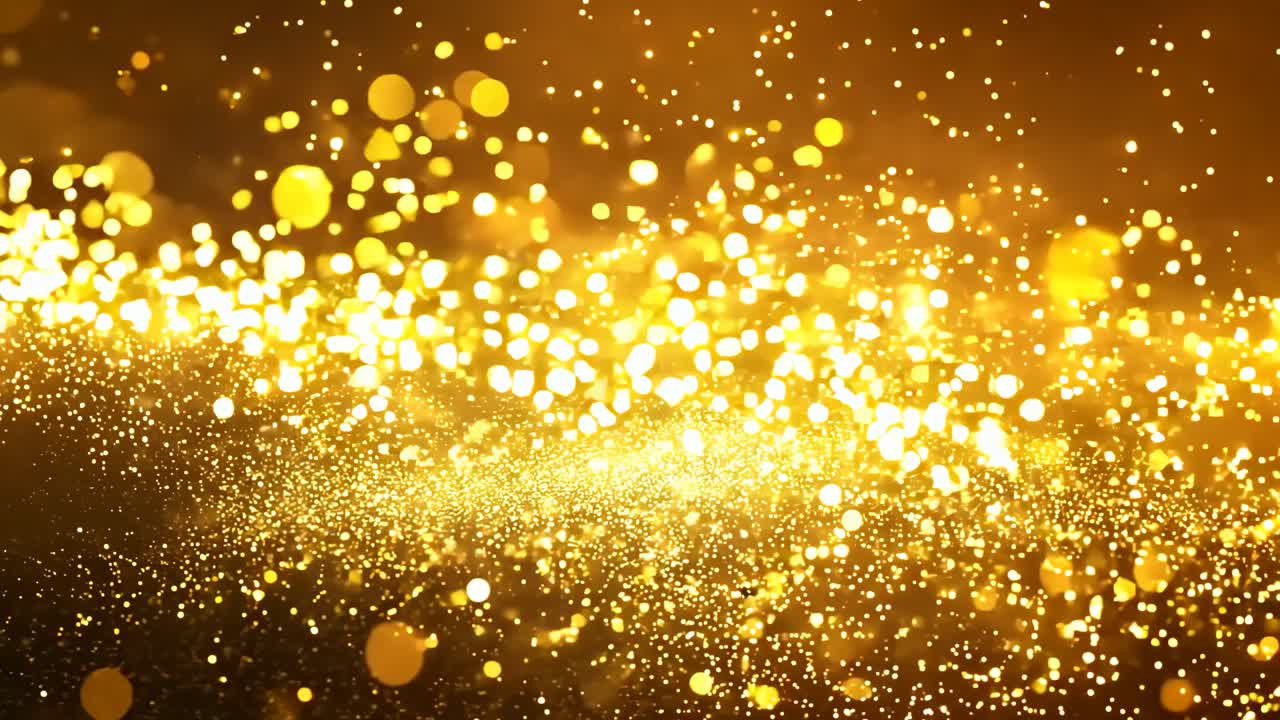 A blurry image of a bright orange and black background with many small dots. The dots are scattered all over the image, creating a sense of movement and energy. The image is abstract and dynamic