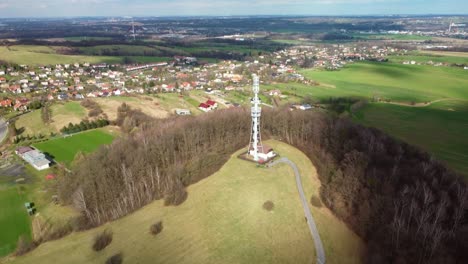 okrouhlá observation tower in staříč, czech republic - aerial drone shot